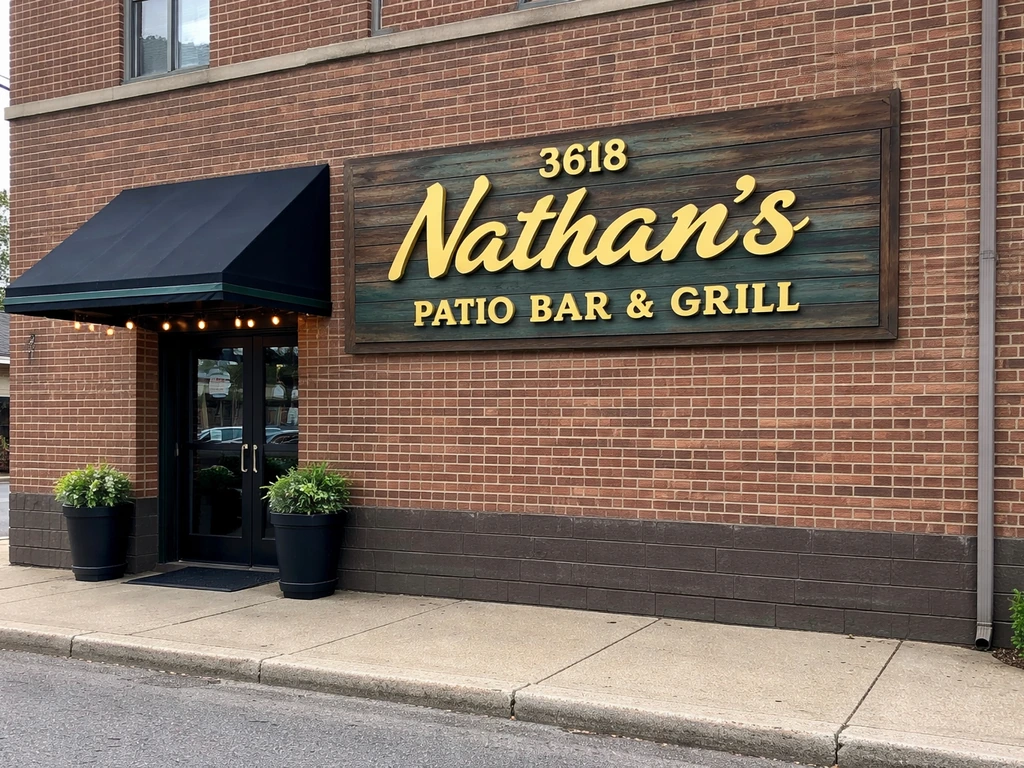 Storefront exterior with the Nathan’s Patio Bar & Grill address/sign area at 725 30th St NE, Canton, Ohio