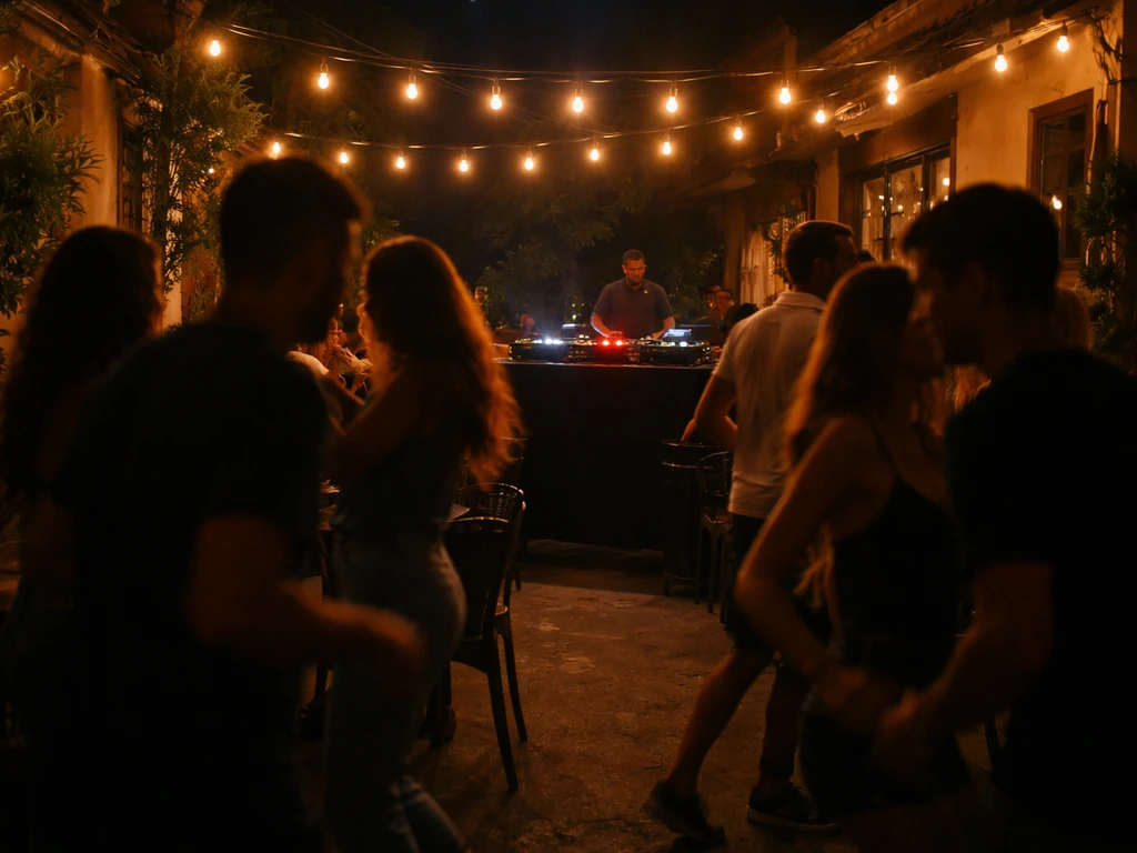 Warm-lit night patio with anonymous crowd dancing as a DJ setup glows in the background.